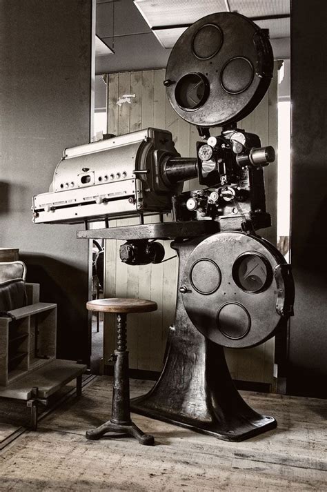 HD movie projector in a dark room streaming on Gomovies